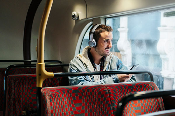 Listening with headphones on a bus